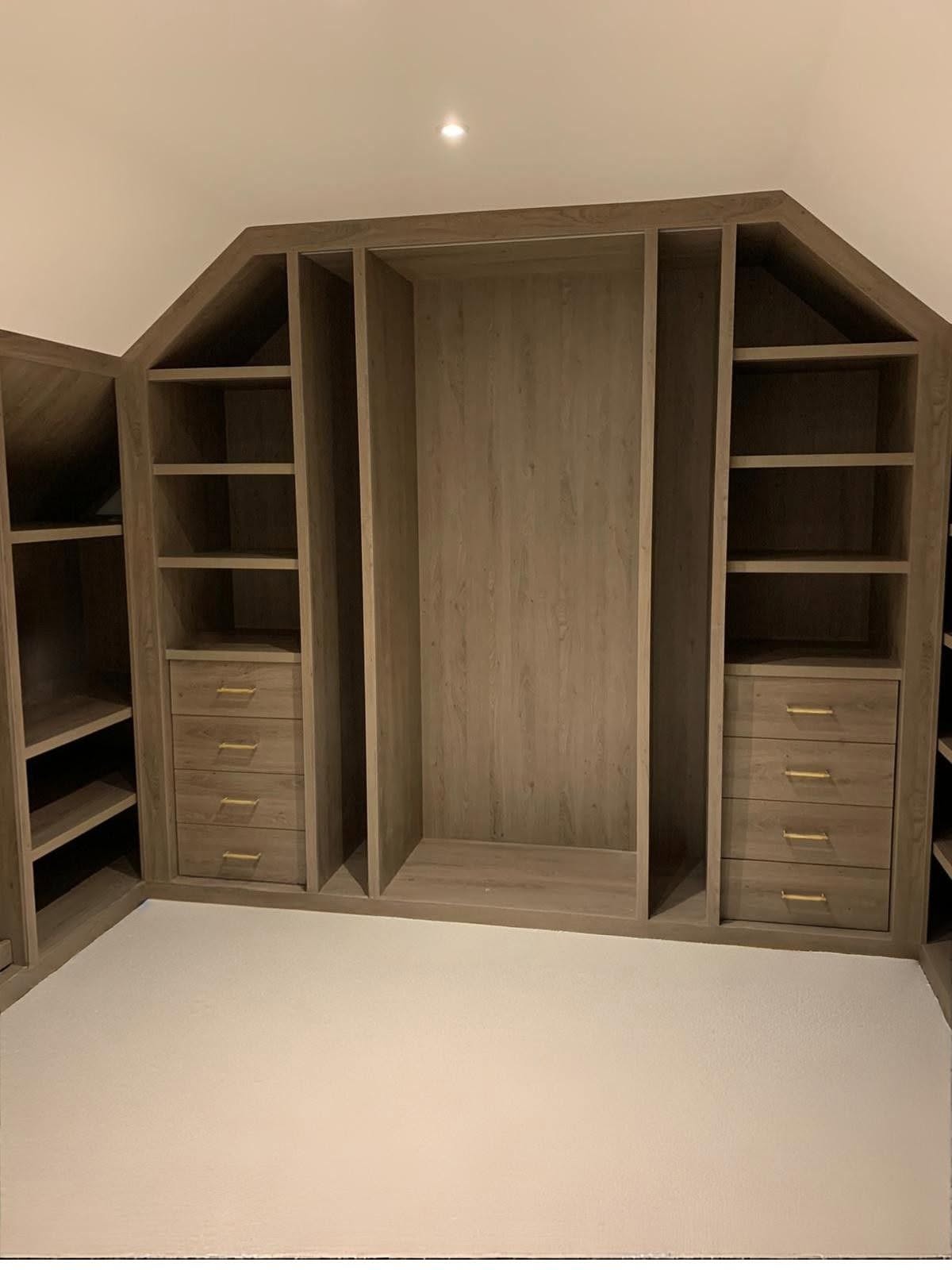 Symmetrical bespoke wardrobe installation in a completed loft conversion