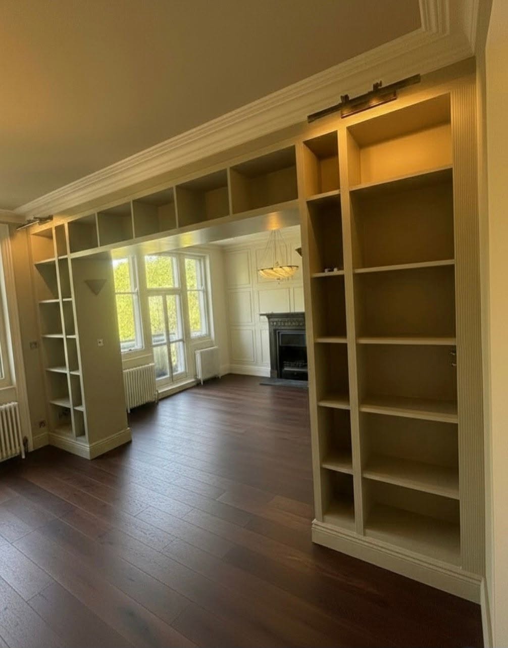 Bespoke built-in bookshelves fitted during a house refurbishment